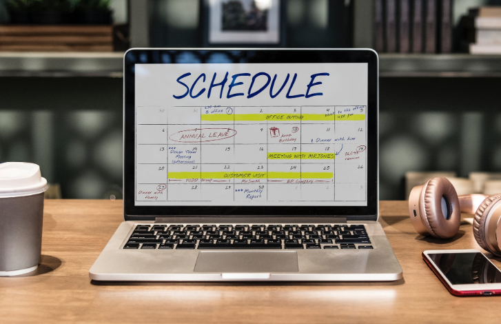 schedule arrangements on a laptop
