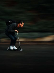 riding a scooter